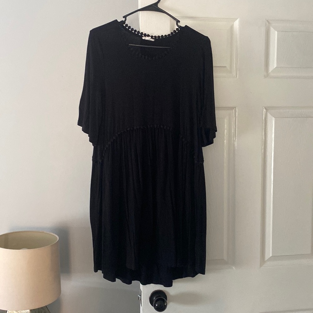 Black baby doll dress with dot detail. Size small but could fit medium!